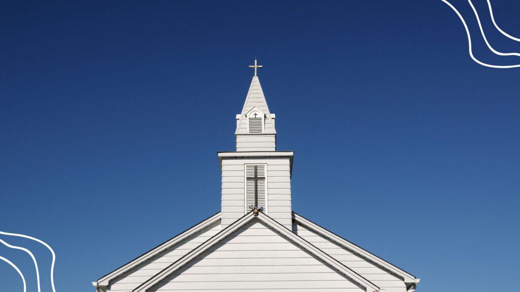 Prayers for Church Growth and Development - (12) - picture of a church with a steeple against a blue cloudless sky