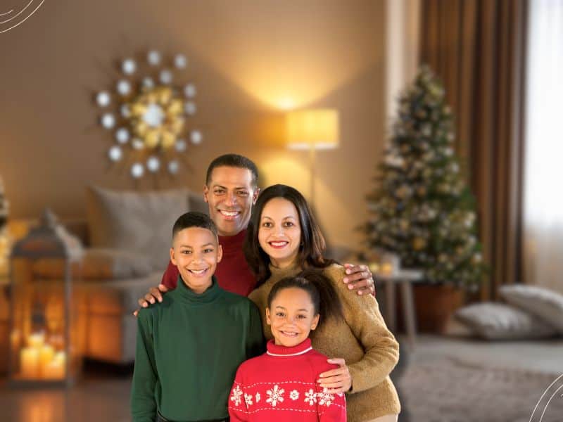 christmas picture of family in living room